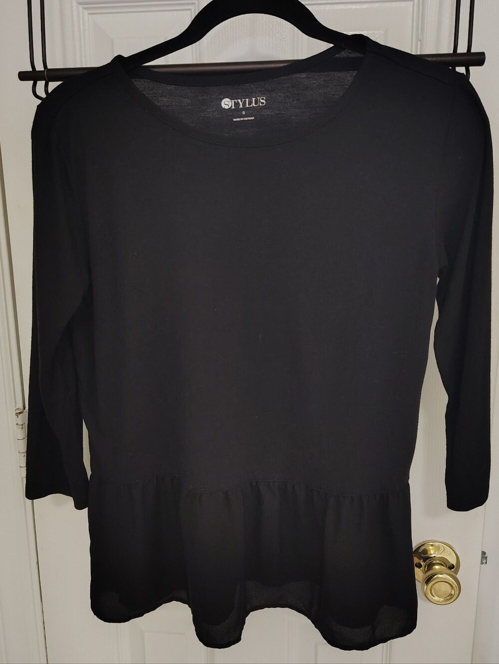 Stylus Women's Black Peplum Long-Sleeve Top